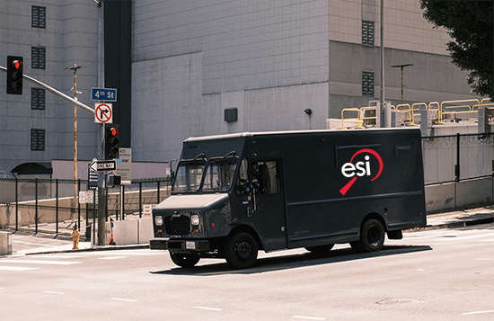 Delivery vehicle with ESI logo on the side.